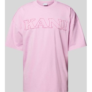 T-shirt Karl Kani z nadrukiem z bawełny w młodzieżowym stylu