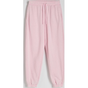 Różowe spodnie sportowe Reserved w sportowym stylu
