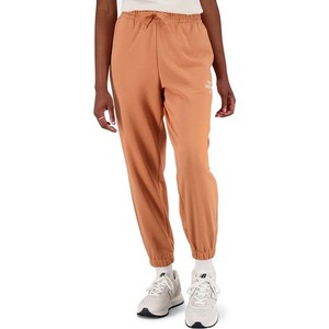 Pomarańczowe spodnie New Balance z bawełny