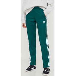 Zielone spodnie sportowe Adidas Originals w sportowym stylu