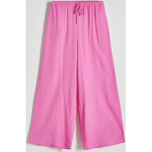 Różowe spodnie Reserved z tkaniny w stylu casual
