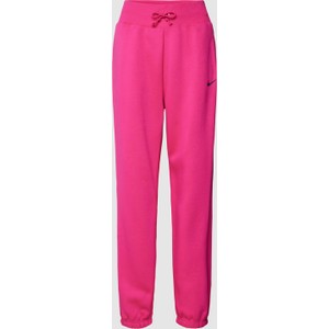 Różowe spodnie Nike z bawełny