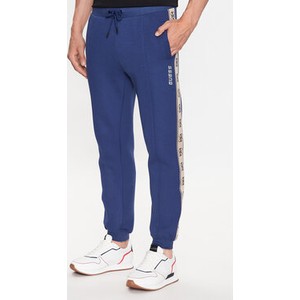Niebieskie spodnie sportowe Guess w sportowym stylu z dresówki