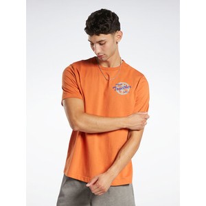 Pomarańczowy t-shirt Reebok z krótkim rękawem w sportowym stylu