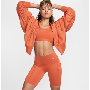 Pomarańczowe szorty Nike w sportowym stylu