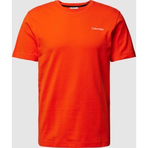 Pomarańczowy t-shirt Calvin Klein z krótkim rękawem w stylu casual z nadrukiem