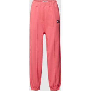Różowe spodnie Tommy Jeans z bawełny
