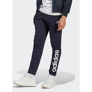 Granatowe spodnie Adidas z dresówki w sportowym stylu