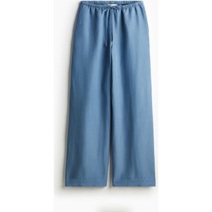 Niebieskie spodnie H & M z tkaniny