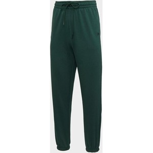 Zielone spodnie New Era w sportowym stylu z dresówki