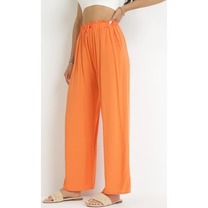 Pomarańczowe spodnie born2be w stylu retro