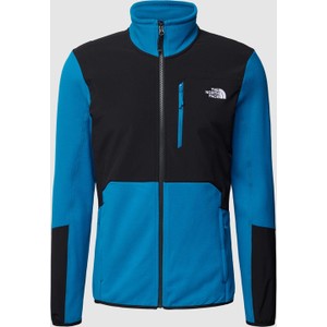 Niebieska kurtka The North Face krótka z wełny w sportowym stylu
