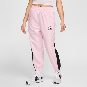 Różowe spodnie Nike z tkaniny w sportowym stylu