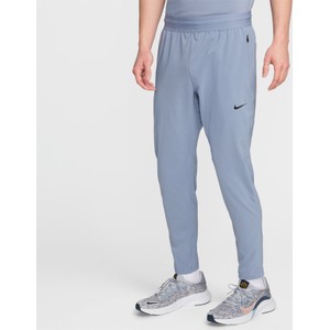 Niebieskie spodnie Nike z tkaniny w sportowym stylu