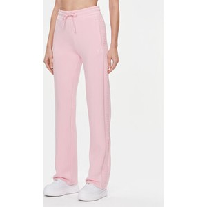 Różowe spodnie sportowe Guess z dresówki w stylu casual