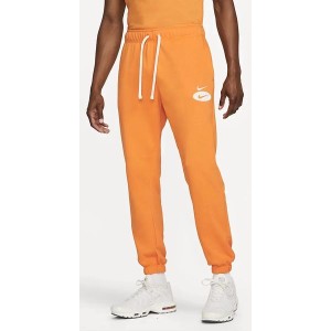 Pomarańczowe spodnie sportowe Nike w sportowym stylu z dresówki
