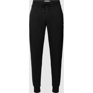 Czarne spodnie Tommy Jeans z bawełny w sportowym stylu
