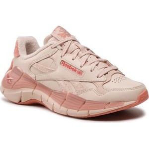 Różowe buty sportowe Reebok w sportowym stylu
