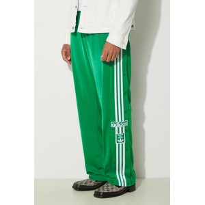 Zielone spodnie Adidas Originals w sportowym stylu