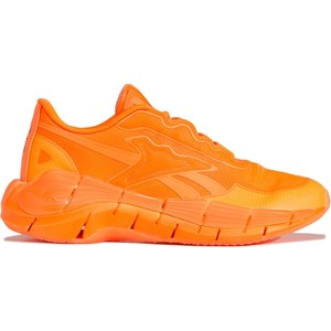 Pomarańczowe buty sportowe Reebok X Victoria Beckham sznurowane w sportowym stylu